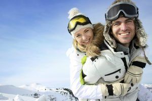 happy-skiing-couplevail-travel-couple 3