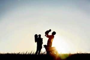 bigstock-silhouette-of-happy-family-and-54362507-happy-family 3